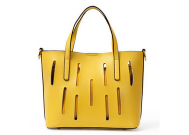 Unique hollow design Fashion Ladies Handbags solid anti wear nail on bottom